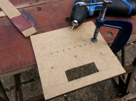 Button hole drilling